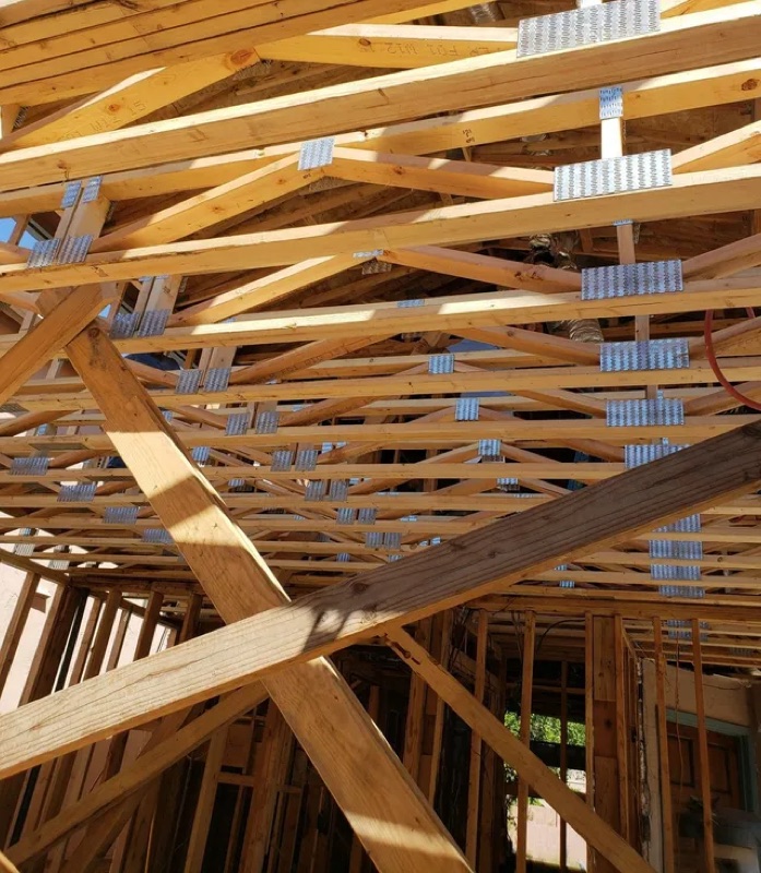 Framed ceiling and wall assembly during interior renovation